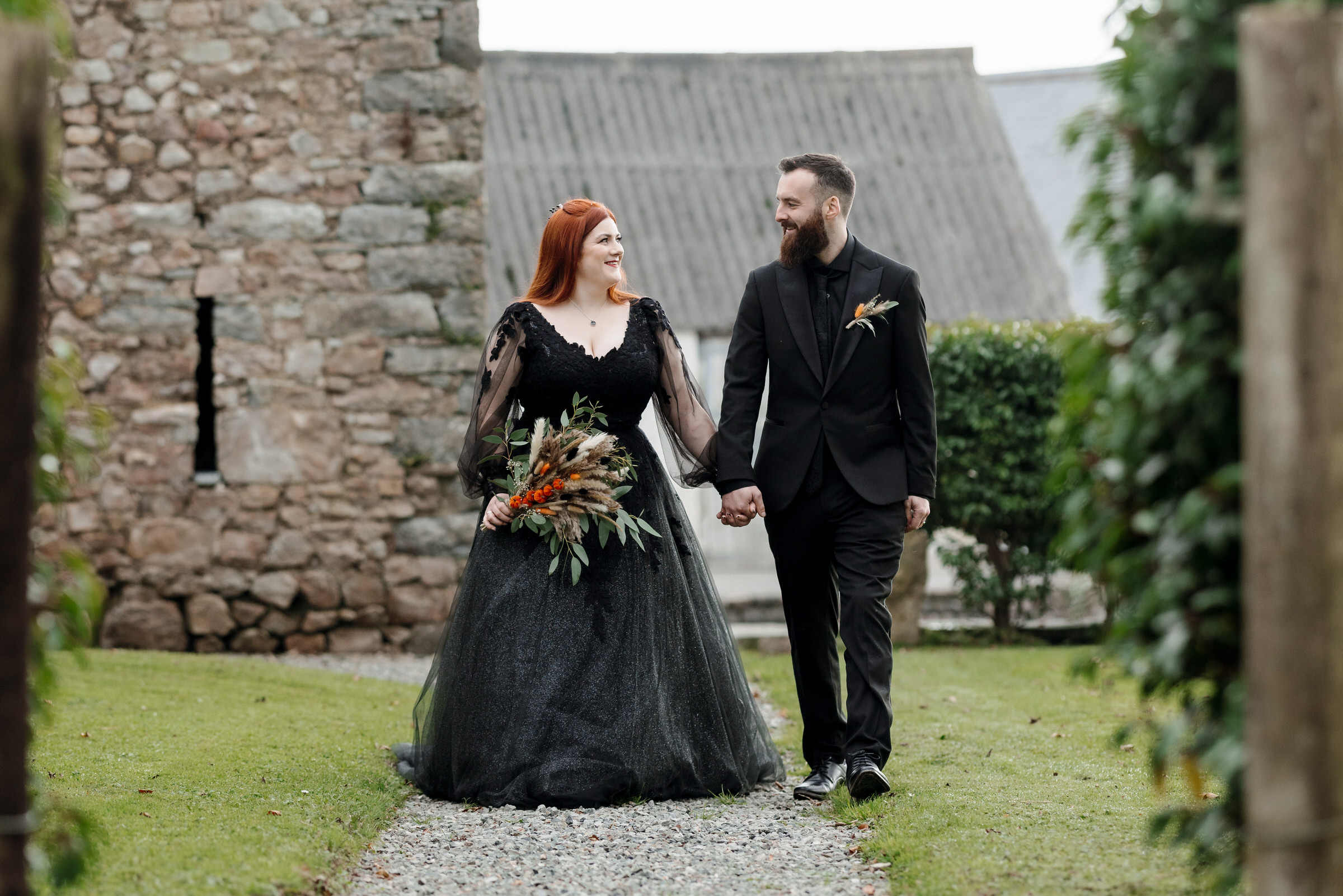 Cardeeth wedding photography. Bride and Groom dressed in black